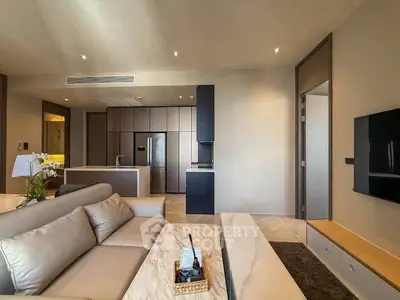 Luxurious modern living room with open kitchen and sleek design