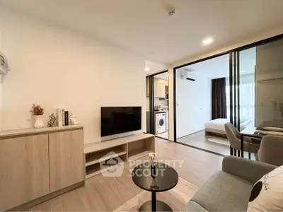 Modern living room with open layout and stylish furniture in a contemporary apartment.
