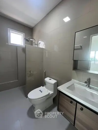 Modern bathroom with sleek fixtures and neutral tones