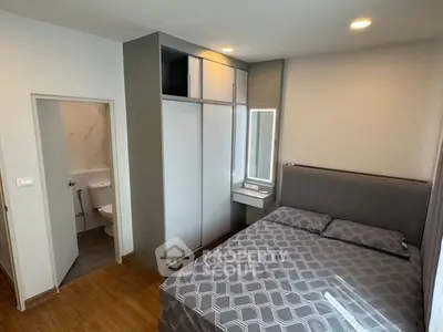 Modern bedroom with ensuite bathroom and stylish decor