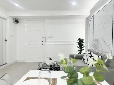 Modern living room with elegant decor and stylish furniture in a bright, inviting space.