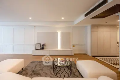 Spacious modern living room with elegant decor and cozy seating area