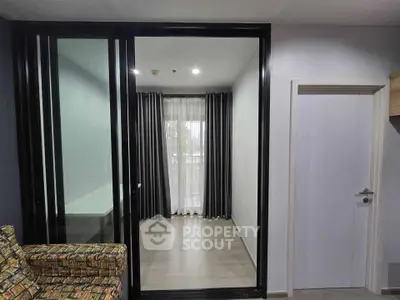 Modern interior with sliding glass doors and cozy seating area