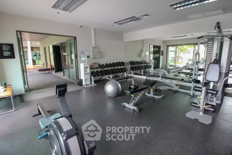 Modern gym with state-of-the-art equipment in a residential building