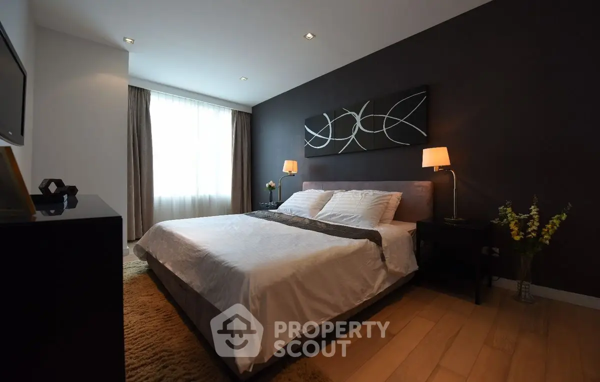 Elegant bedroom with modern decor and cozy lighting