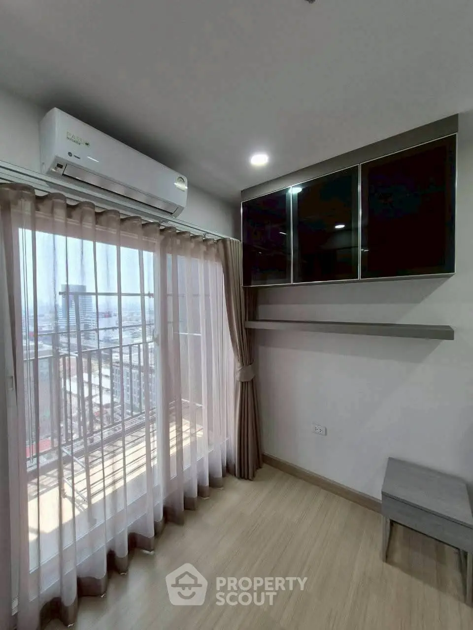 Modern apartment with balcony view and sleek interior design