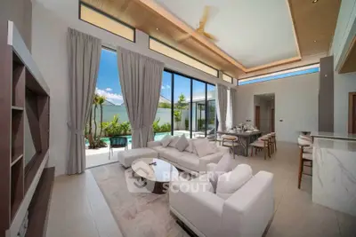 Luxurious modern living room with pool view and elegant decor