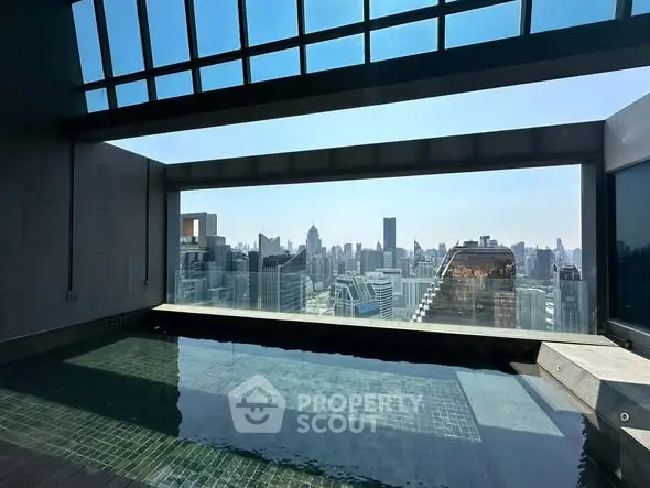 Stunning rooftop pool with panoramic city skyline view