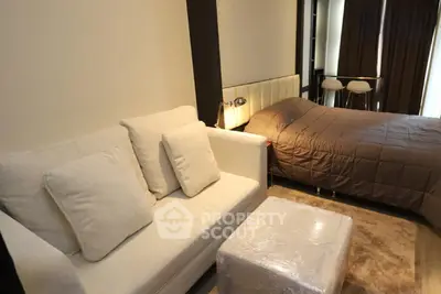 Cozy studio apartment with modern furnishings and natural light