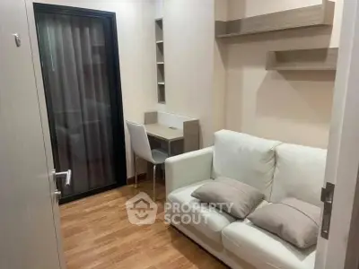 Cozy study room with modern furniture and wooden flooring