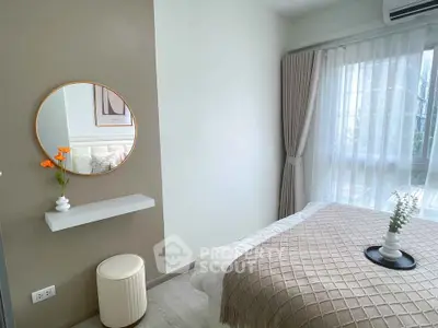 Cozy bedroom with modern decor and natural light