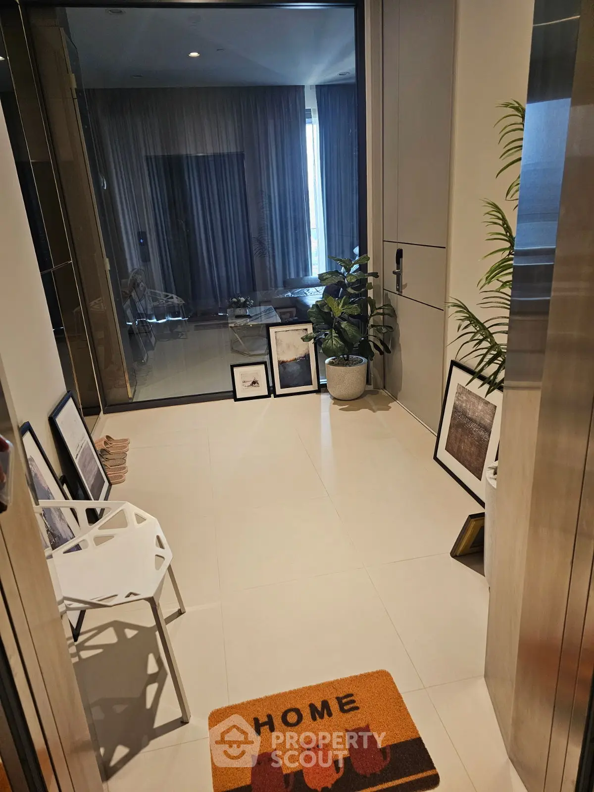 Stylish apartment entrance with modern decor and welcoming mat