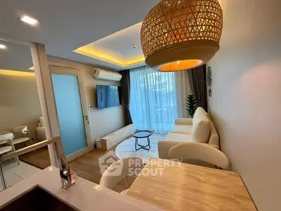 Modern living room with cozy seating and stylish lighting