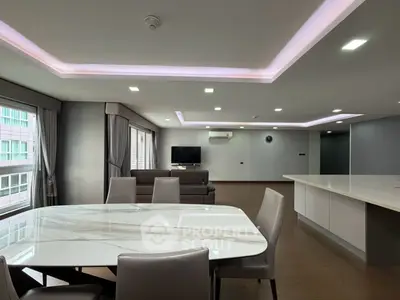Spacious modern living room with open layout and elegant dining area