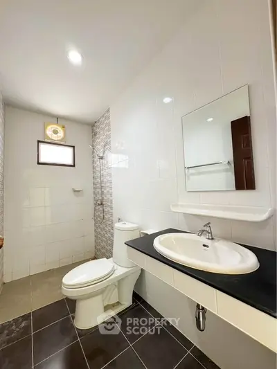 Modern bathroom with sleek fixtures and stylish tile design