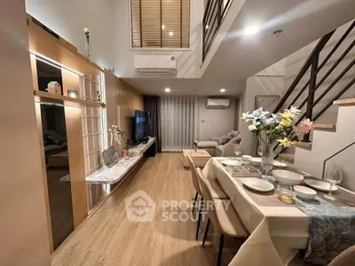 Spacious modern living room with dining area and stylish decor
