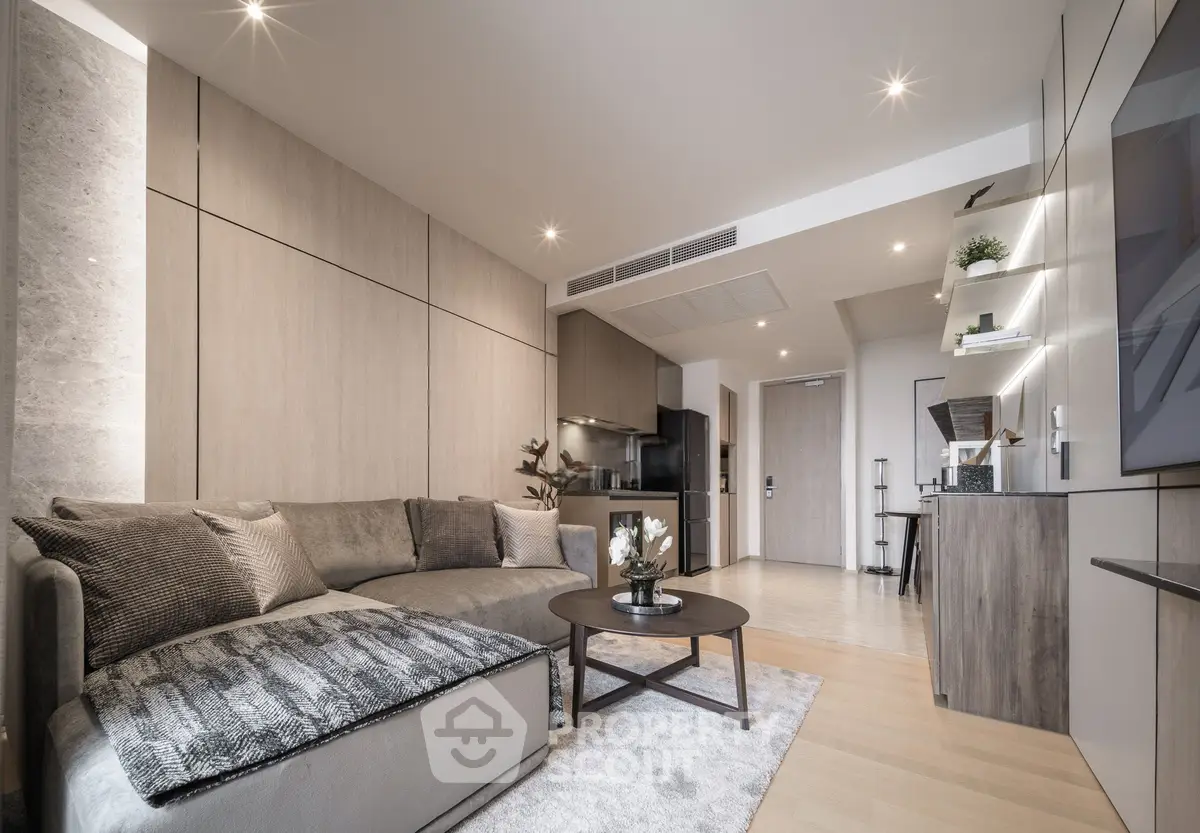 Modern living room with sleek design and cozy ambiance, featuring a stylish sofa and contemporary decor.