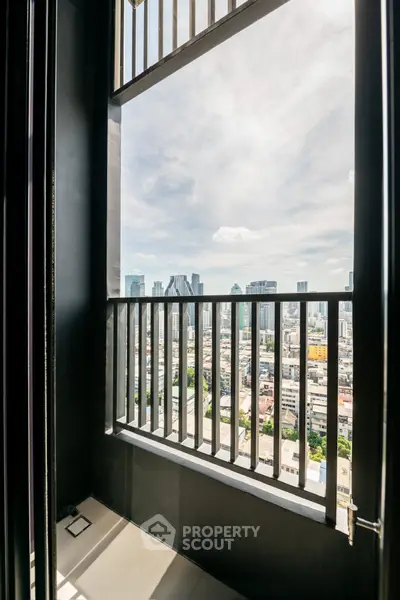 Stunning cityscape view from a modern high-rise balcony, perfect for urban living enthusiasts.