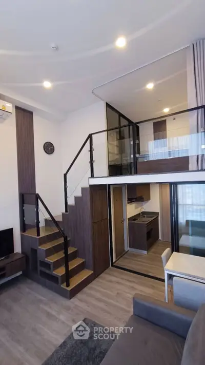 Modern loft apartment with mezzanine bedroom and stylish open kitchen