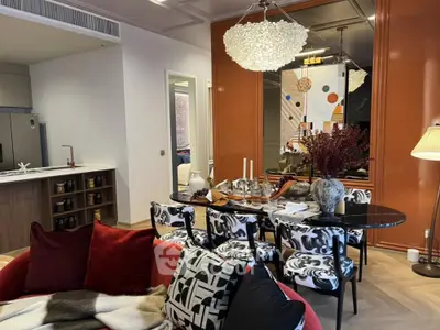 Luxurious modern living room with stylish dining area and open kitchen