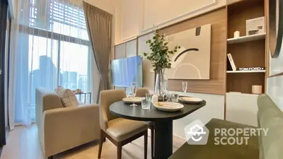 Modern living room with elegant dining area and city view, featuring stylish decor and natural light.