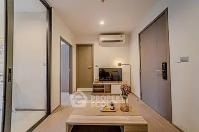 Modern living room with sleek design and air conditioning unit