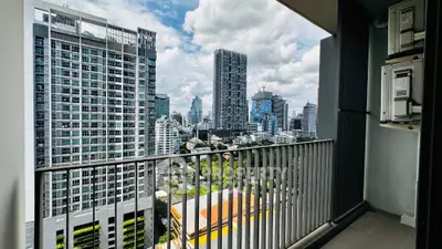 Stunning cityscape view from modern balcony in high-rise apartment