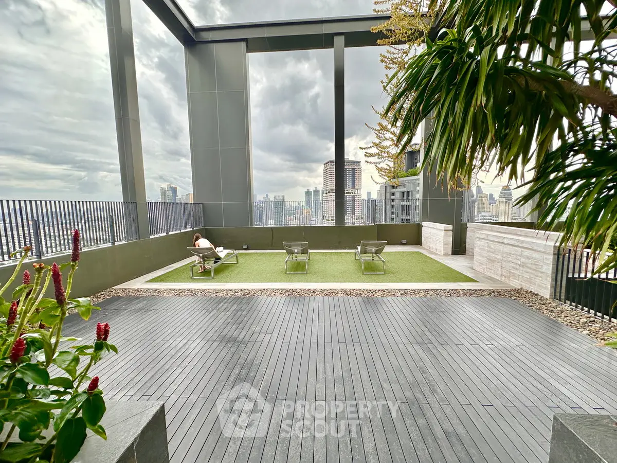 Stunning rooftop terrace with city views and modern design, perfect for relaxation and entertainment.