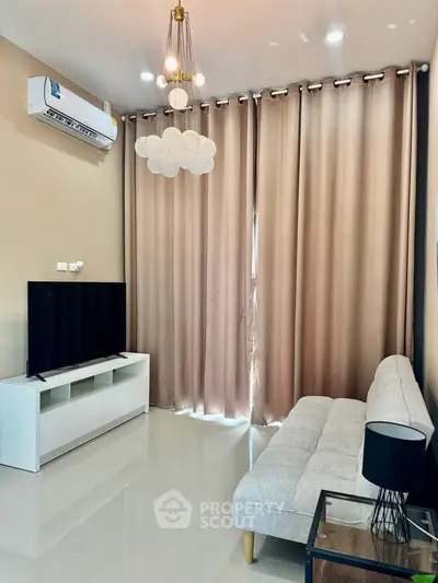 Modern living room with sleek furniture and stylish lighting