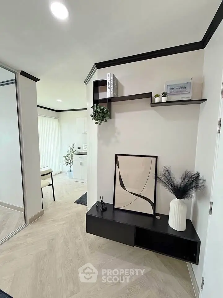 Modern interior with stylish decor and shelving in a contemporary living space.