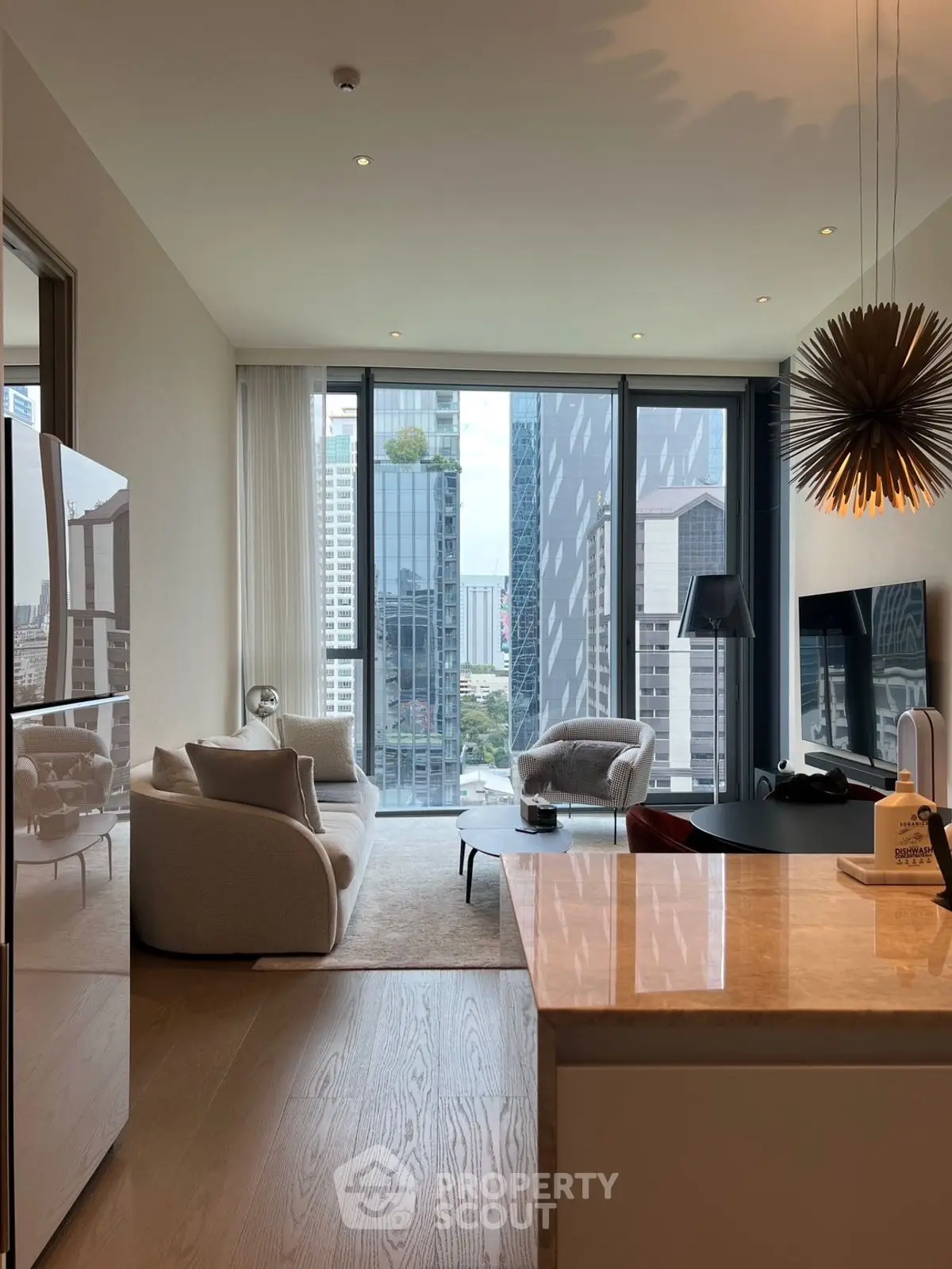 Luxurious modern living room with stunning city view and elegant decor