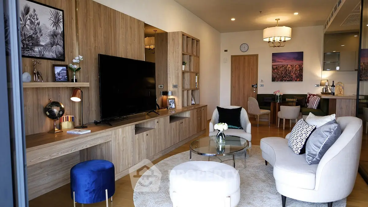 Luxurious living room with modern decor and stylish furniture in a high-end apartment.