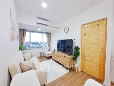 Modern living room with large window and stylish decor