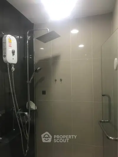 Modern bathroom with sleek shower and water heater