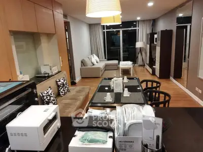 Spacious modern living room with open kitchen and stylish decor