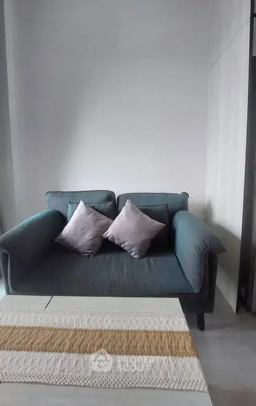 Cozy living room with stylish sofa and decorative pillows