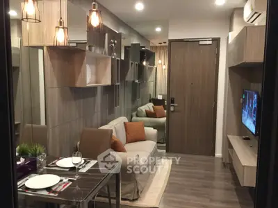  1 Bedroom Condo at Whizdom Essence Sukhumvit Livingroom