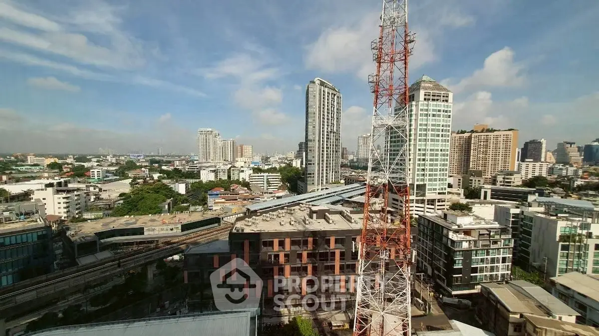 Stunning cityscape view with high-rise buildings and clear blue sky.