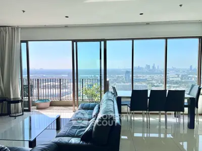 Luxurious living room with stunning city view and modern furnishings