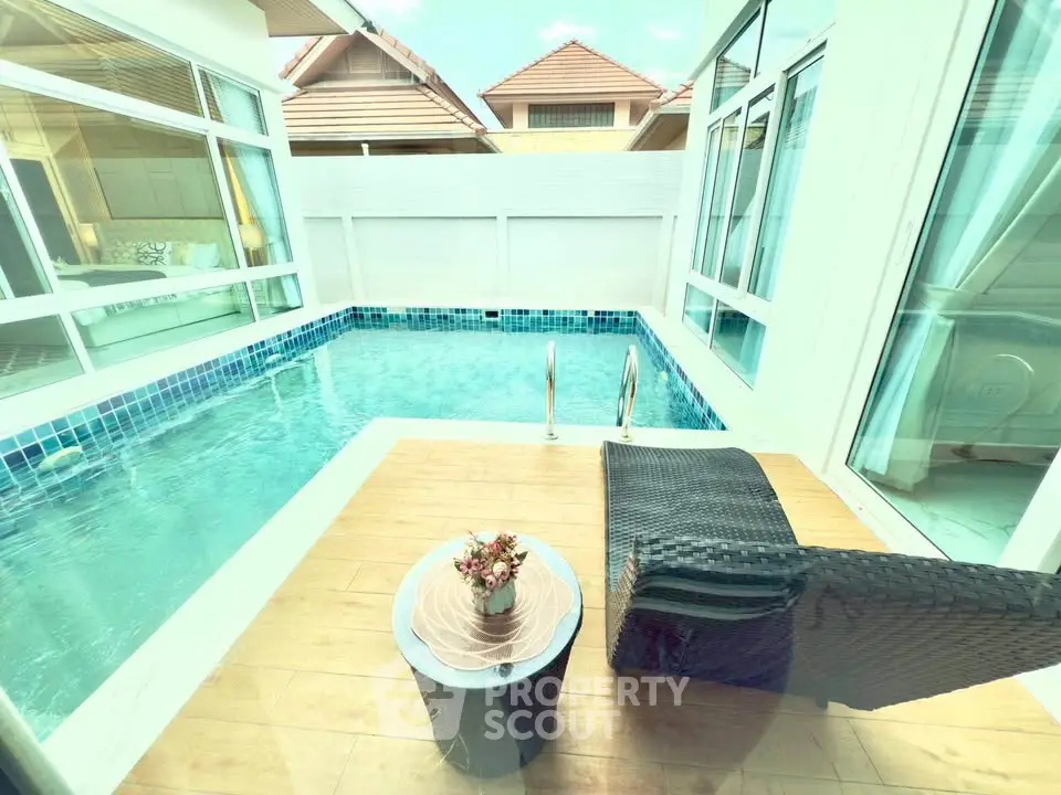 Luxurious private pool with sunbed and modern design, perfect for relaxation and leisure.
