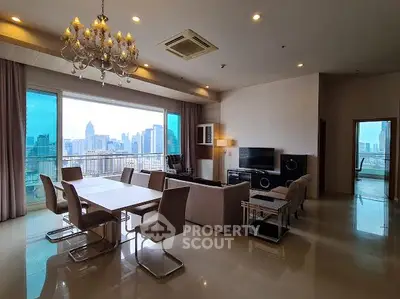 Luxurious living room with stunning city view and elegant chandelier