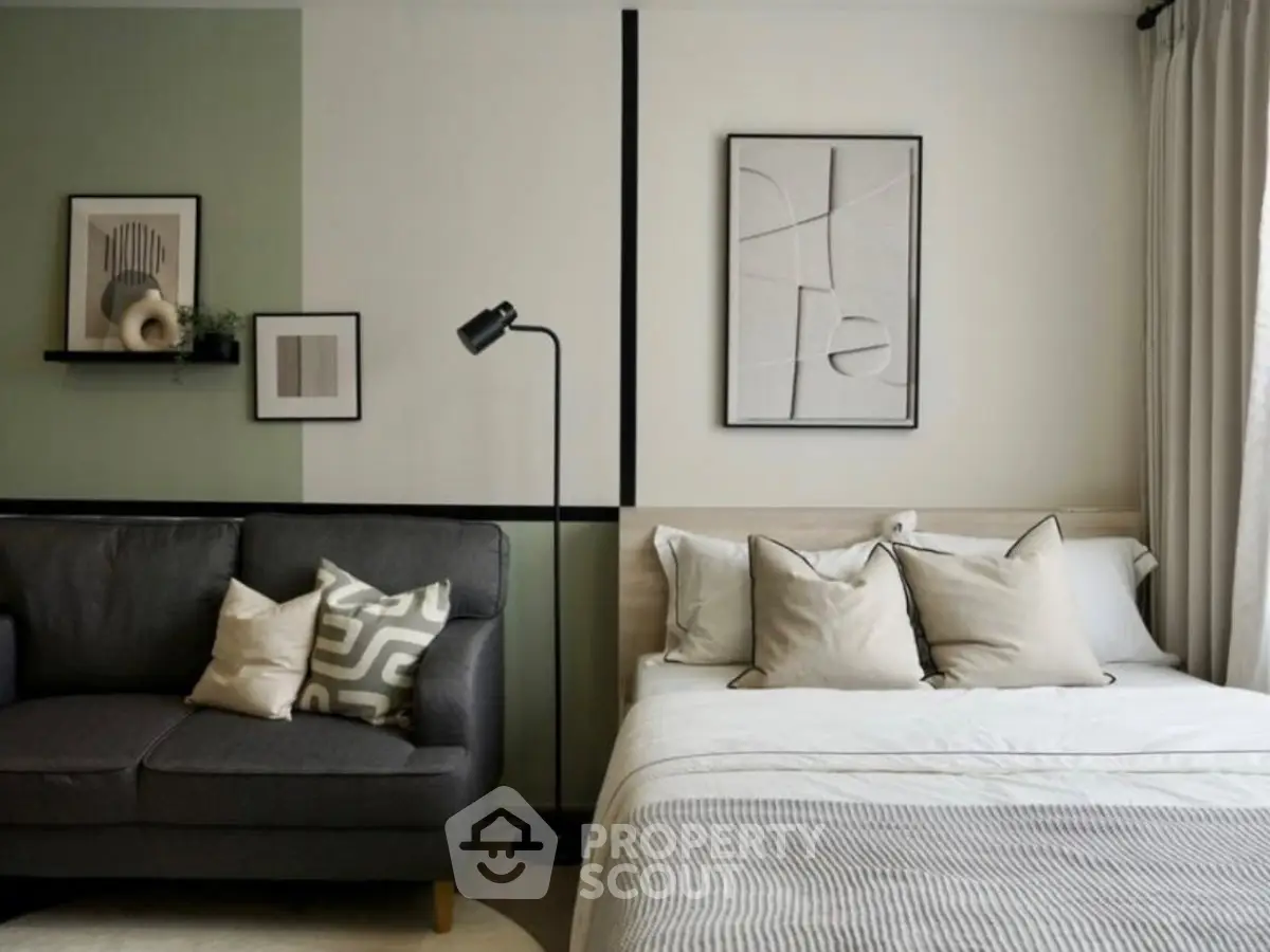 Modern bedroom with stylish decor and cozy seating area, perfect for relaxation and comfort.