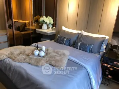Luxurious bedroom with elegant decor and plush bedding
