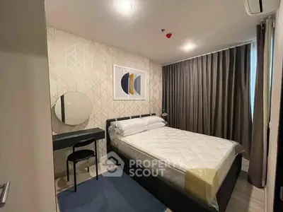 Modern bedroom with stylish decor and cozy ambiance in a contemporary apartment.