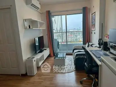 Modern living room with city view, featuring stylish furniture and a cozy atmosphere.