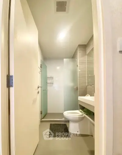 Modern bathroom with sleek design and glass shower enclosure