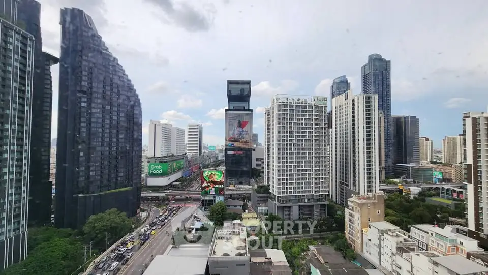 Stunning cityscape view showcasing modern skyscrapers and bustling urban life, perfect for real estate investment.