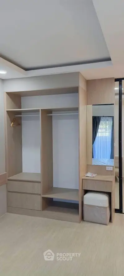 Spacious walk-in closet with modern design and ample storage space