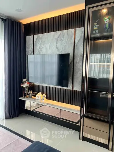 Modern living room with sleek TV setup and stylish decor