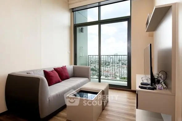 Modern living room with city view and stylish furniture